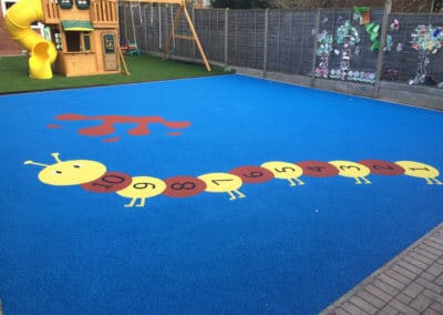 caterpillar wet pour nursery surfacing